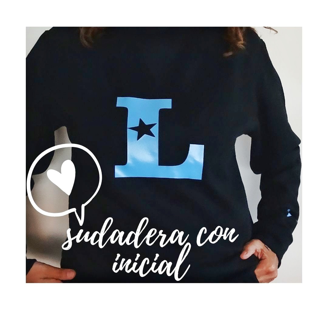 Sudadera inicial con estrella.